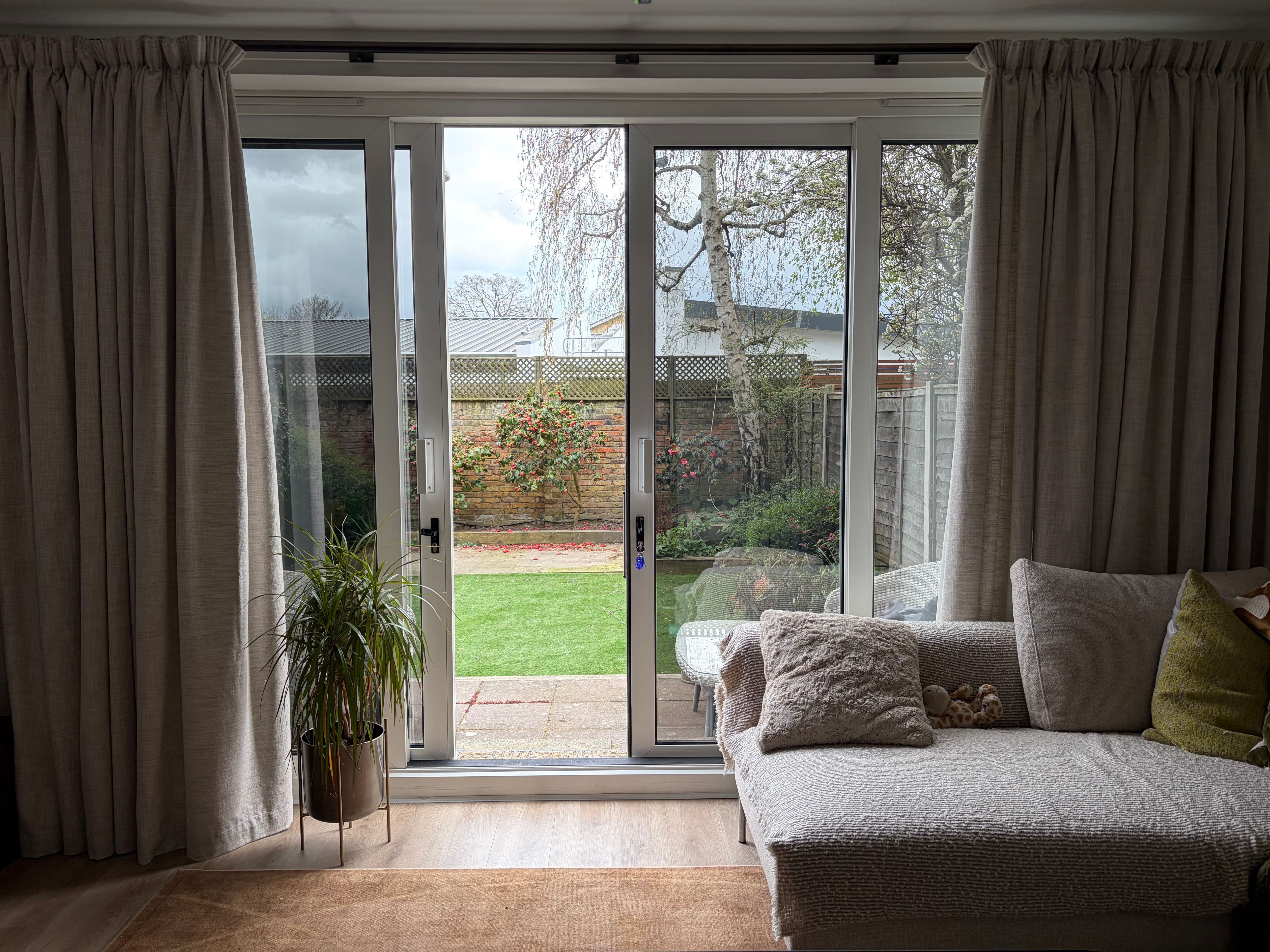 Crystal clear garden view from inside a Slough home after heat reduction window film install